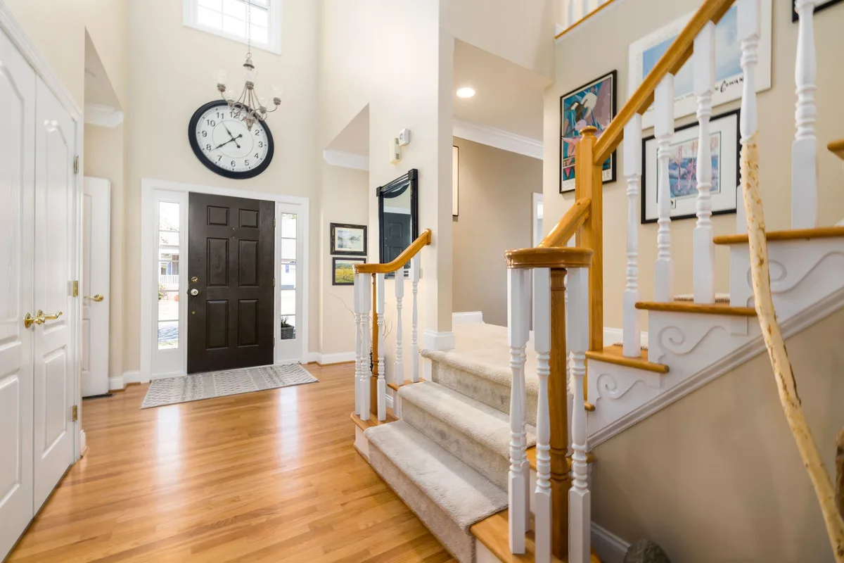 how high to hang a chandelier in a two story entryway