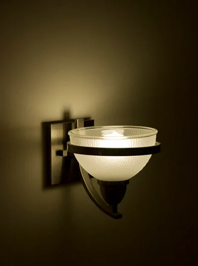 how to remove stuck bulb from wall sconce