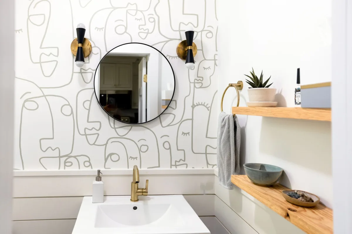 How to Mix Metals With Wall Sconces and Faucets