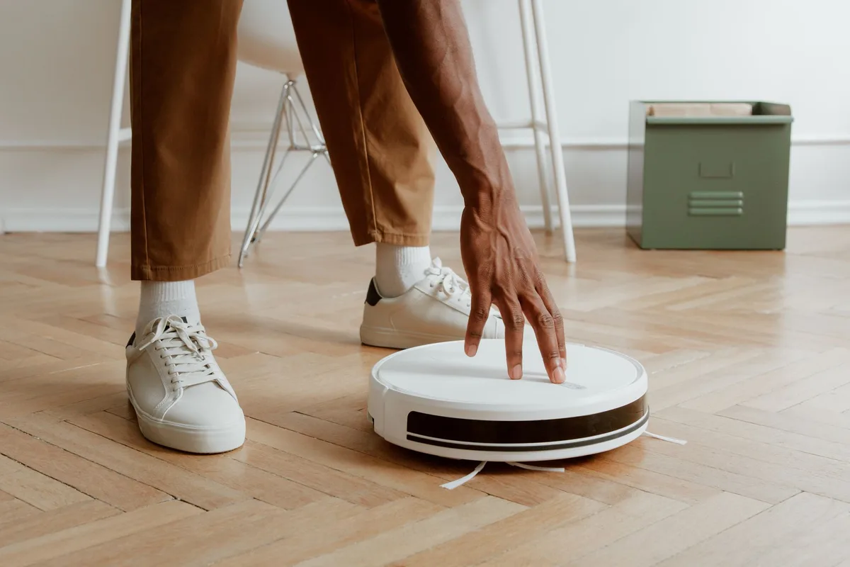 how to empty shark robot vacuum